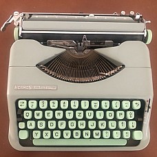 Machine à écrire portable mécanique Hermes Baby