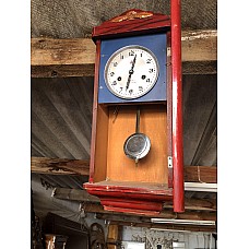 Horloge murale ancienne à balancier