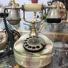 Téléphone vintage à cadran rotatif style marbre